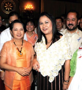 gma-jun-rosemer-color Philippine President Gloria Macapagal Arroyo (left) with Rosemer Enverga at the award ceremonies in Malacanang Palace.