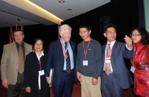 Toronto MP Bob Rae (3rd from left) who spoke in the event, mingles with ethnic journalists in between the Saturday sessions.